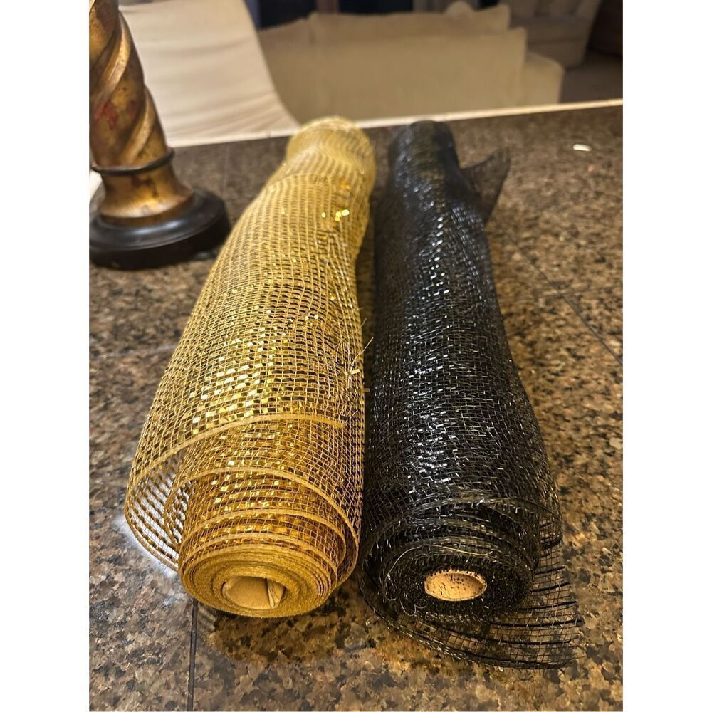 Two large rolls of mesh ribbon